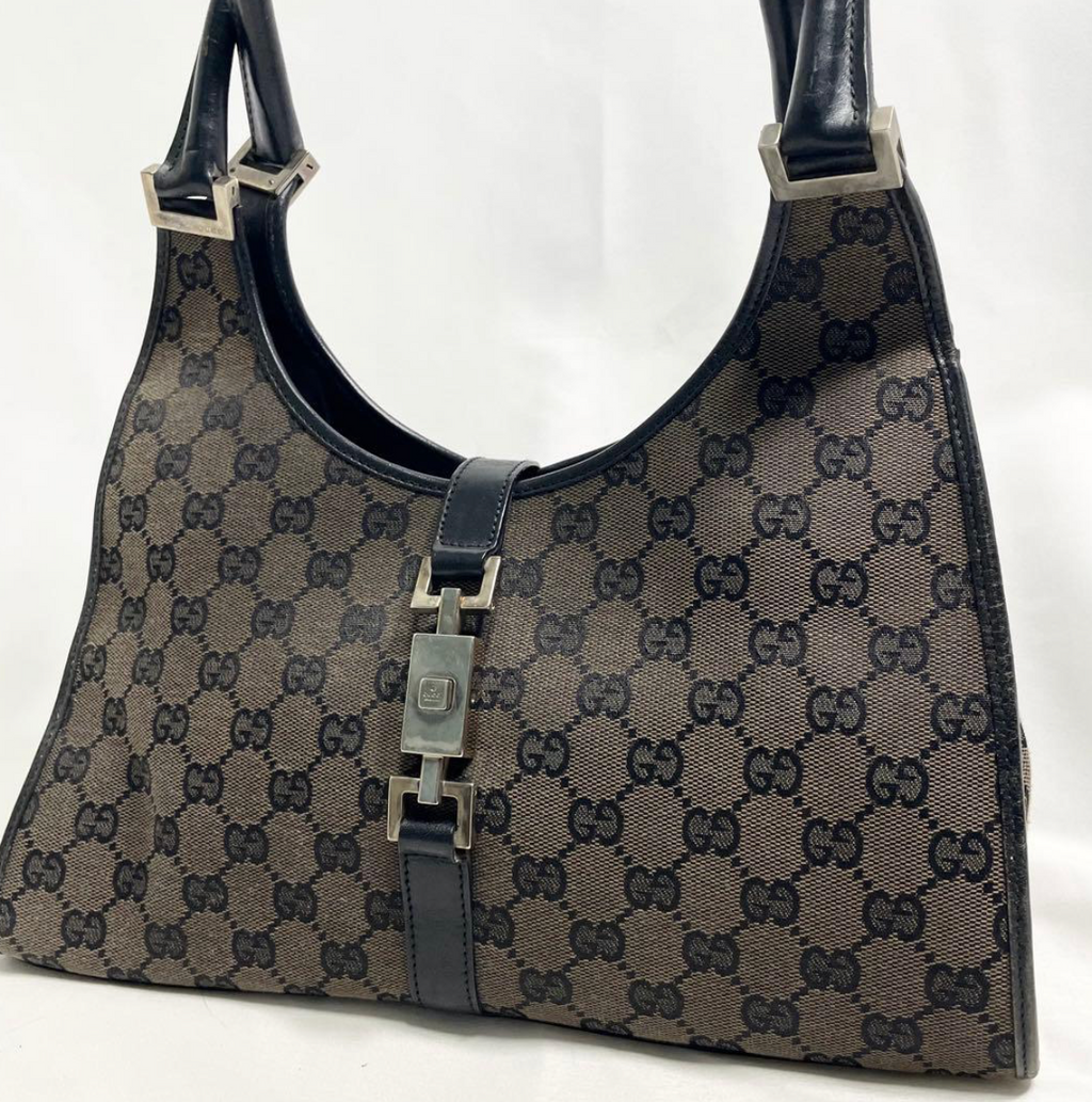 Gucci Jackie en toile GG Canvas noire / beige.