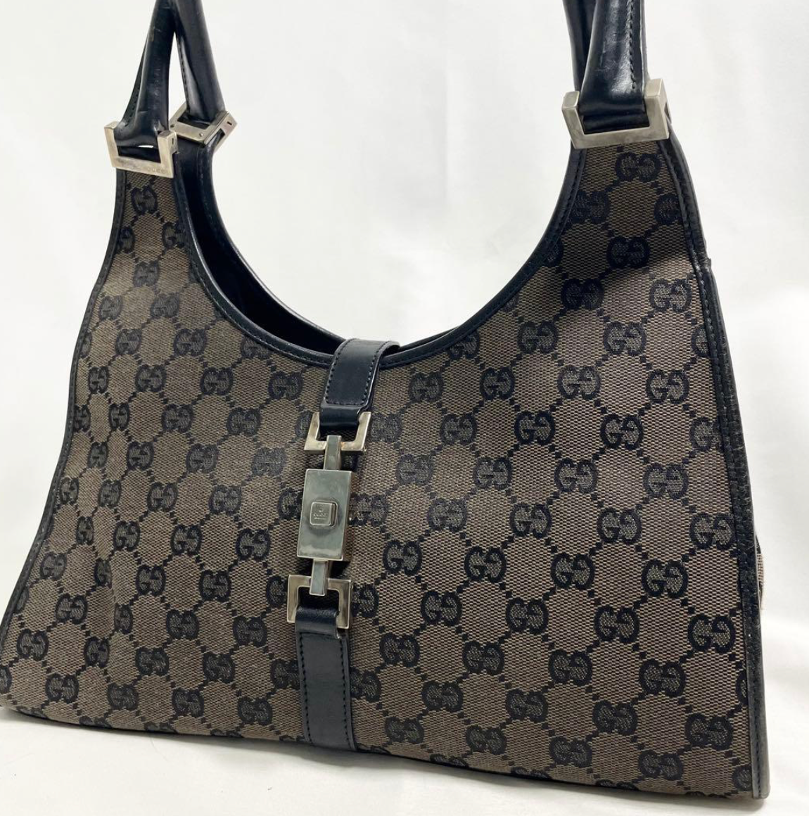 Gucci Jackie en toile GG Canvas noire / beige.