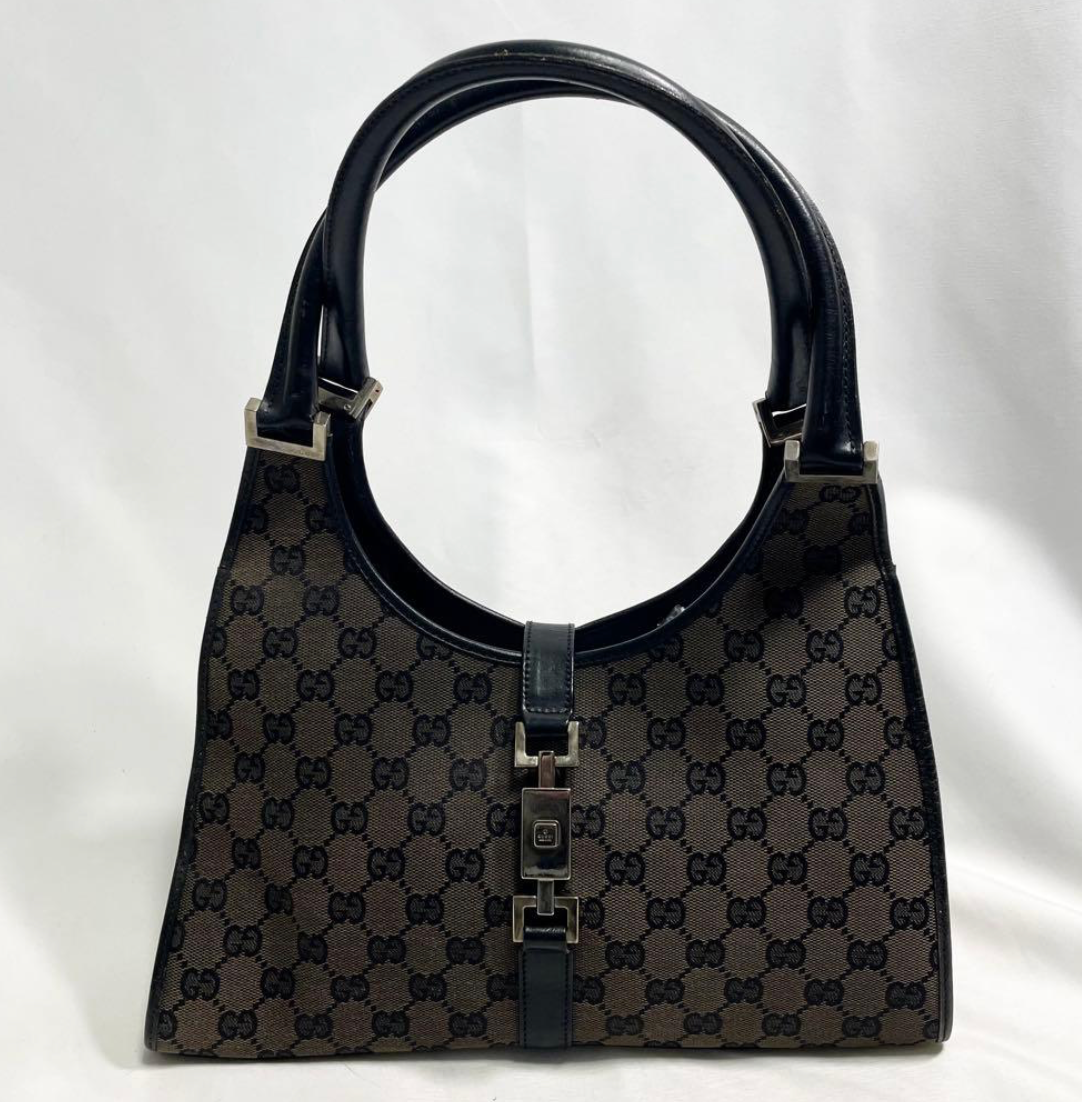 Gucci Jackie en toile GG Canvas noire / beige.