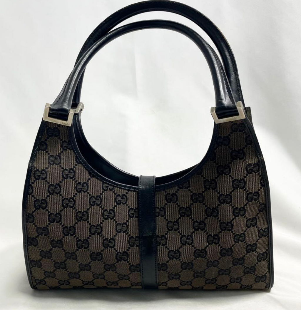 Gucci Jackie en toile GG Canvas noire / beige.