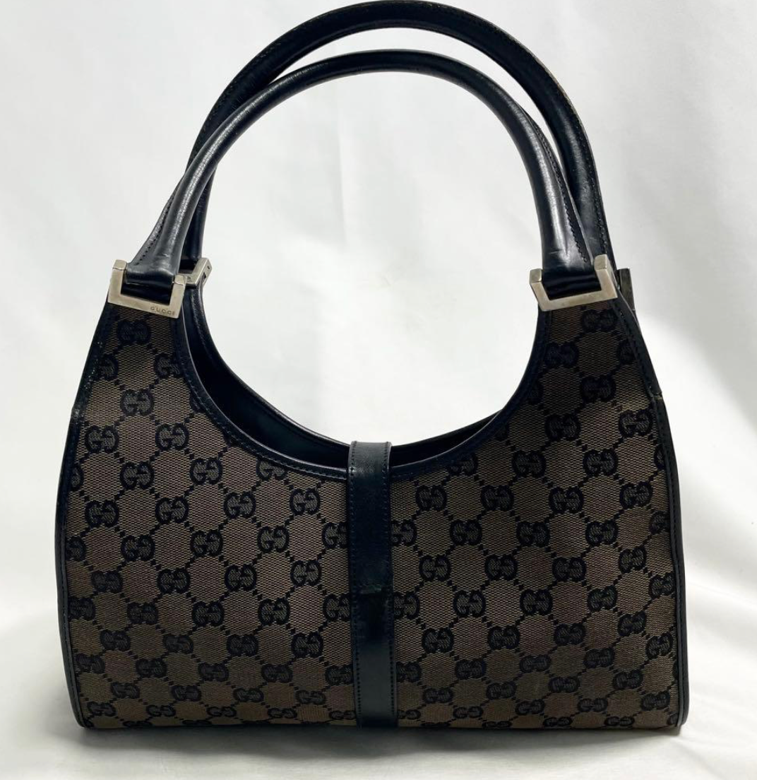 Gucci Jackie en toile GG Canvas noire / beige.