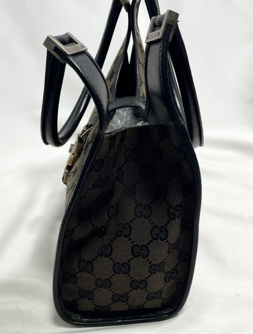 Gucci Jackie en toile GG Canvas noire / beige.