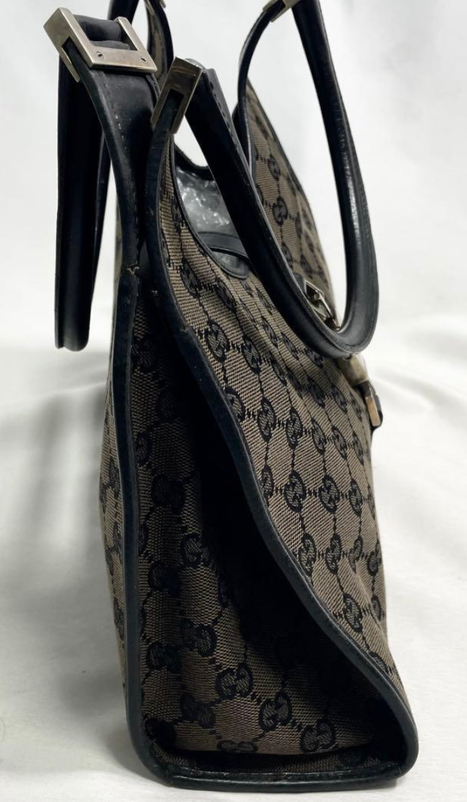 Gucci Jackie en toile GG Canvas noire / beige.