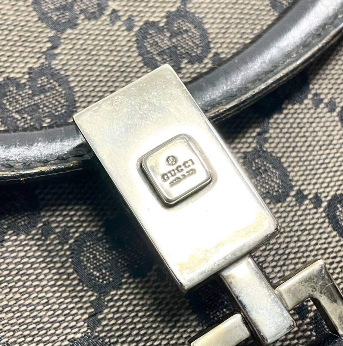 Gucci Jackie en toile GG Canvas noire / beige.