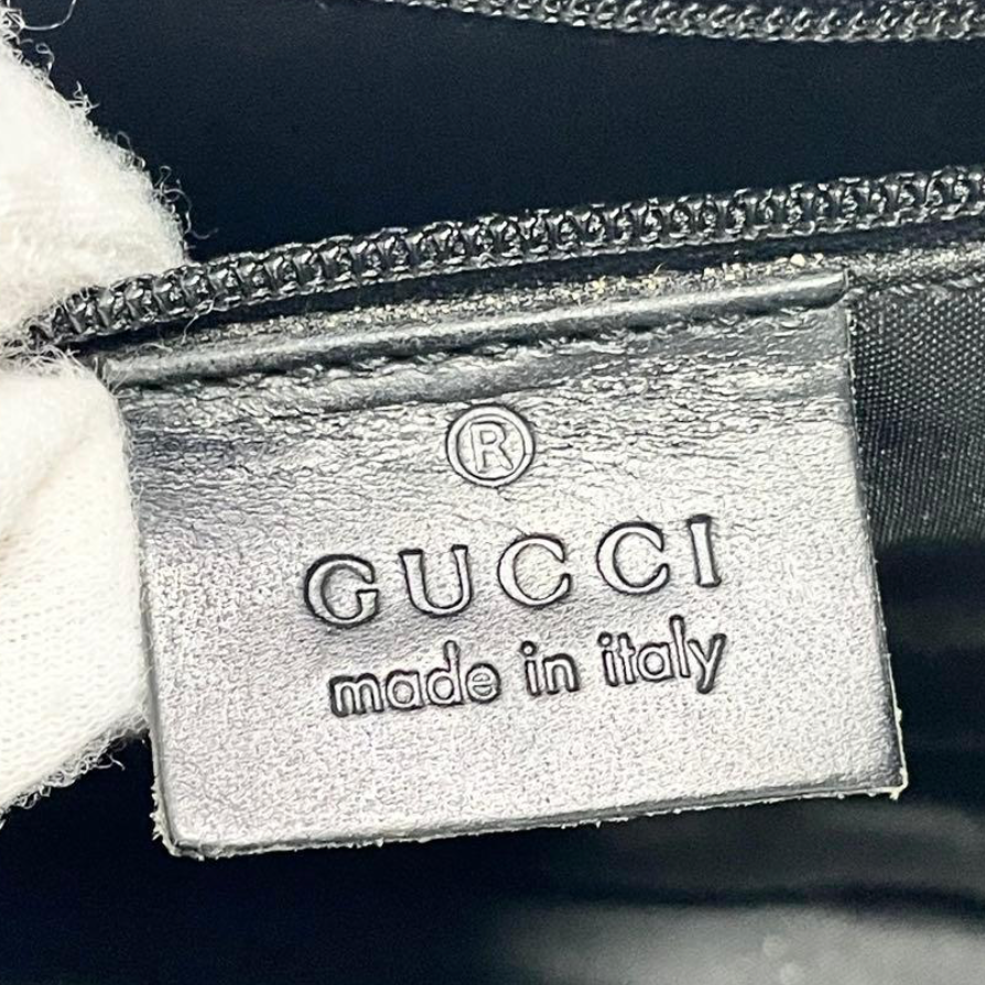 Gucci Jackie en toile GG Canvas noire / beige.