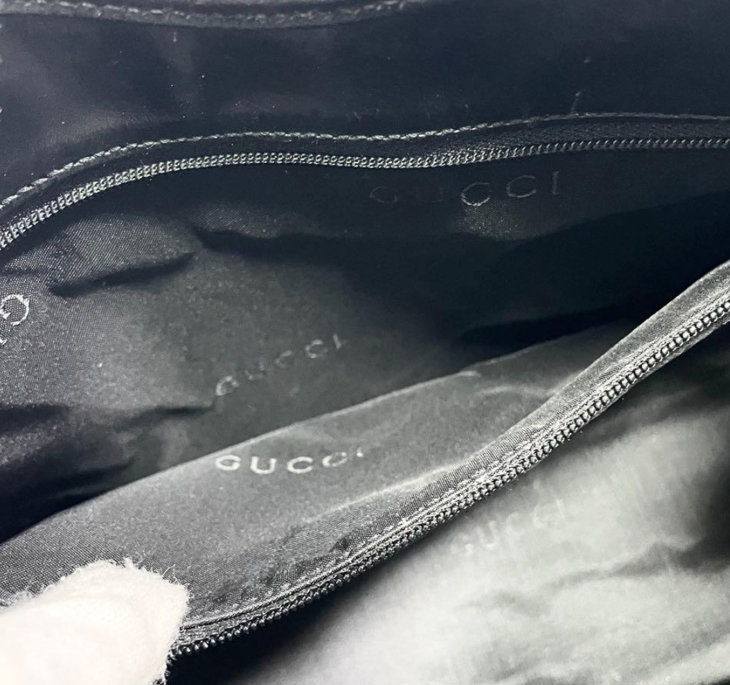 Gucci Jackie en toile GG Canvas noire / beige.