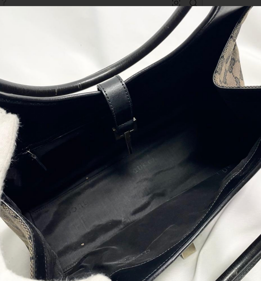 Gucci Jackie en toile GG Canvas noire / beige.