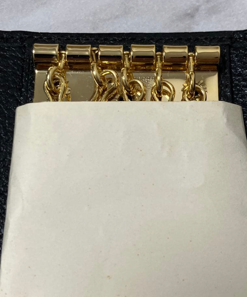 YVES SAINT LAURENT – Porte-clés 5 Anneaux (Noir)