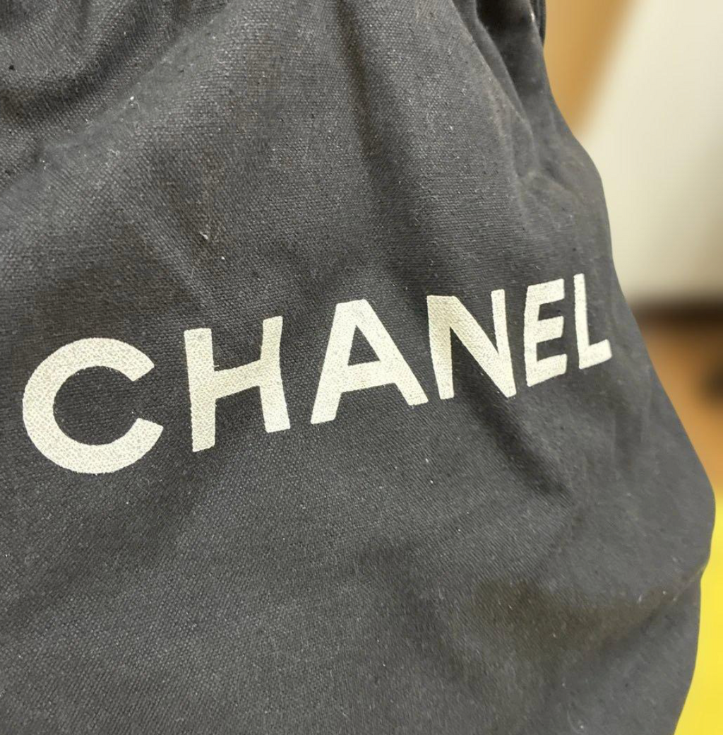 CHANEL – Sac Piscine Drawstring Canvas Noir