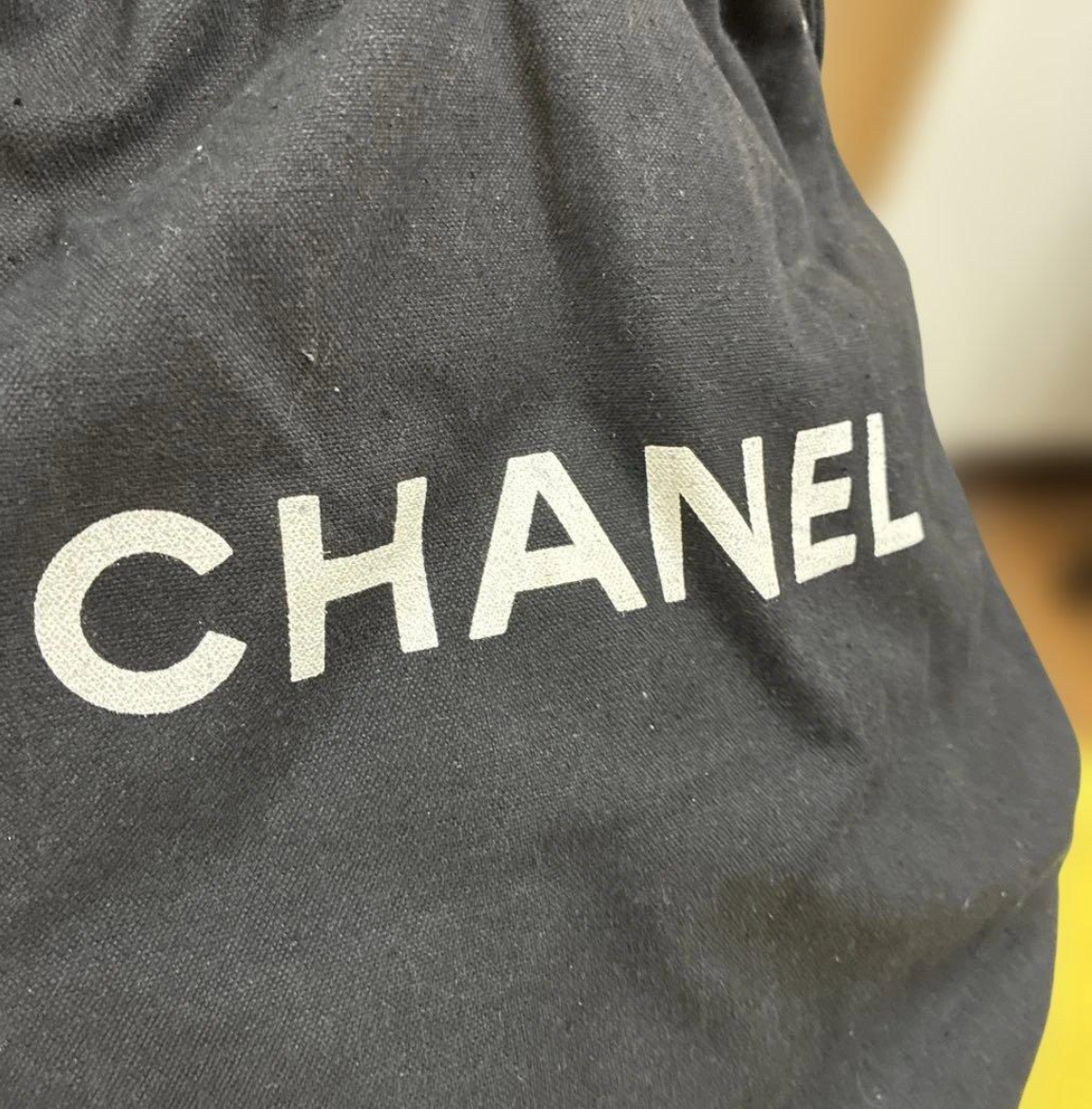 CHANEL – Sac Piscine Drawstring Canvas Noir
