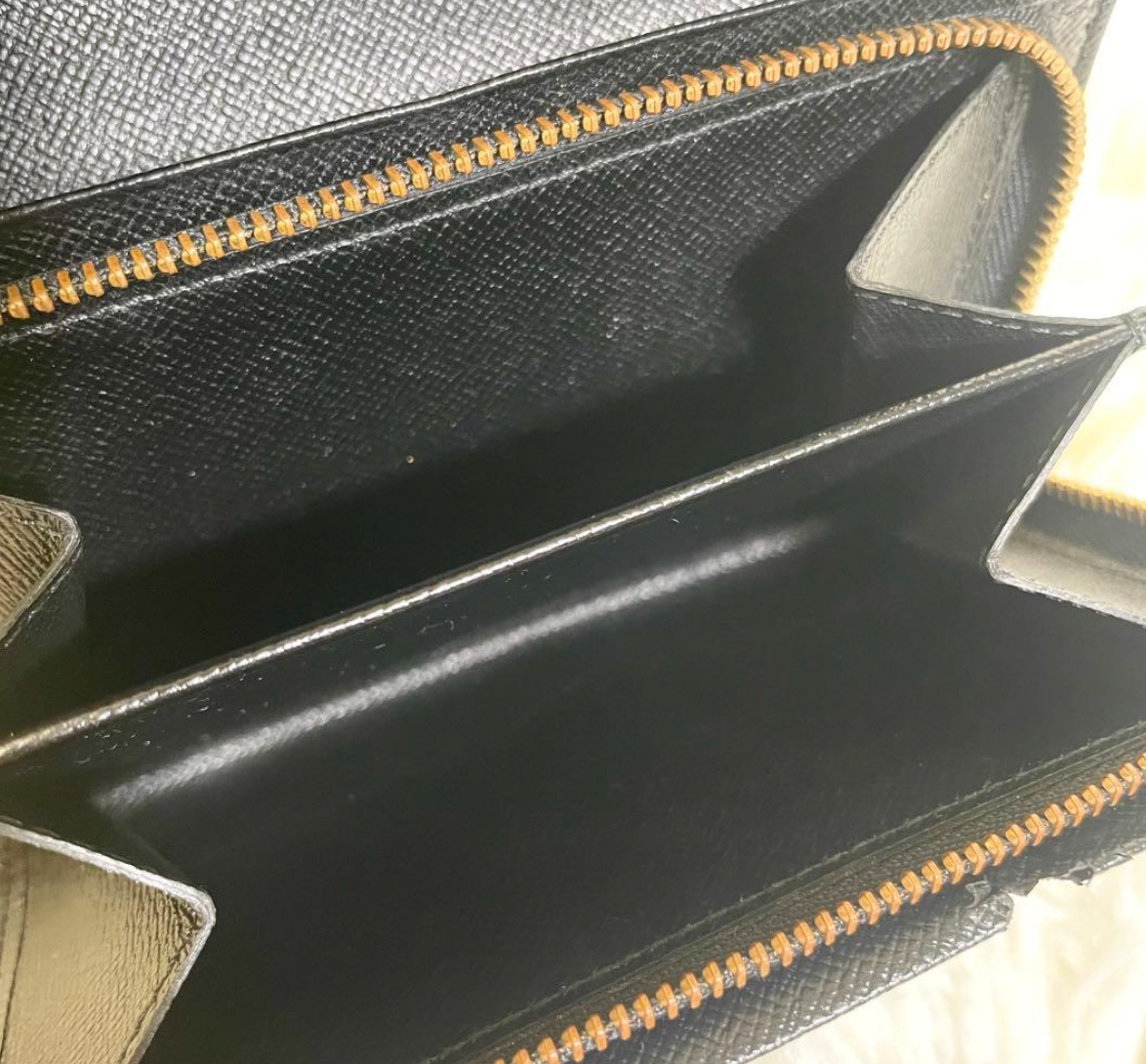 Louis Vuitton Portefeuille Épi Noir M63972 – Cuir – Format Long – Bon État