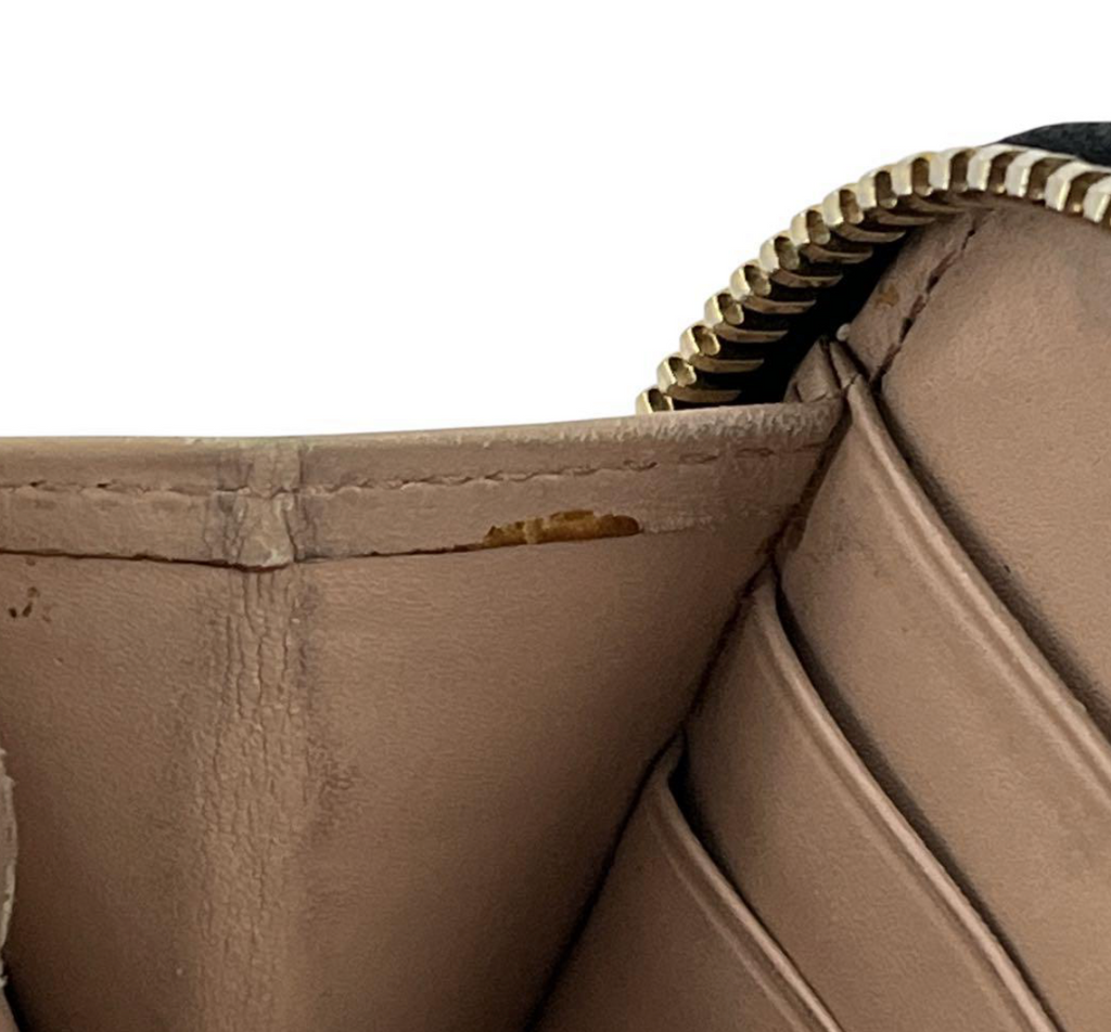 Prada Portefeuille Long Noir Saffiano – Zip – Logo Métal – Unisexe