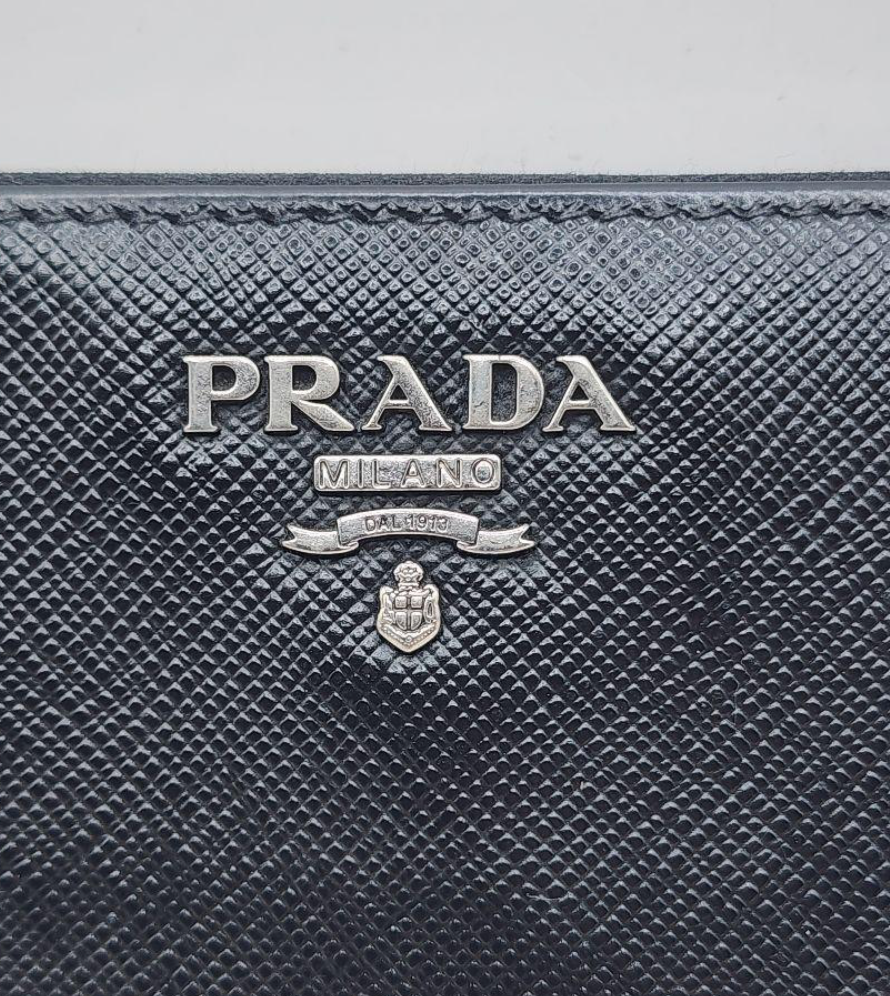 Prada Portefeuille Long Noir – Zip – Cuir
