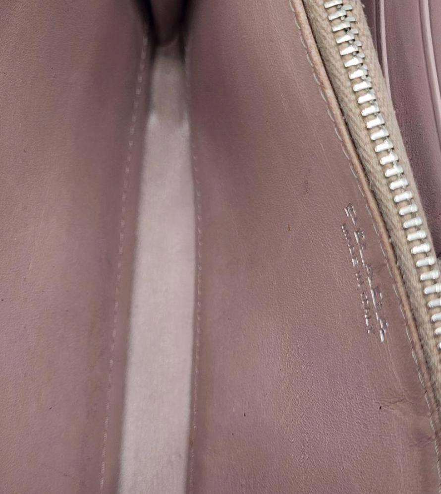 Prada Portefeuille Long Noir – Zip – Cuir